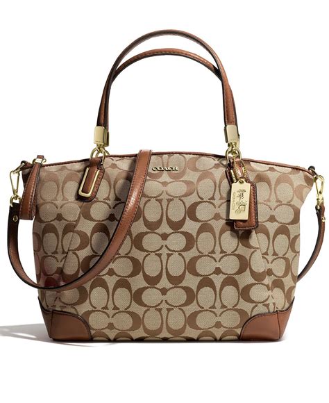 coach signature fabric handbags.